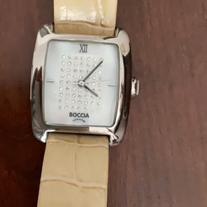 Boccia Titanium ladies watch. Crystals on the face. Genuine leather band.